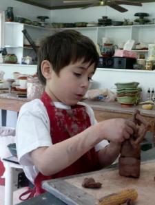 Elijah making a sculpture